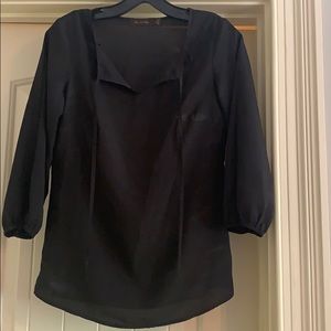 Black business casual blouse.